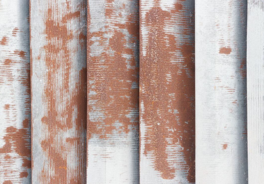 Weathered corrugated metal siding with rust requiring surface prep before repainting in Santa Rosa, CA